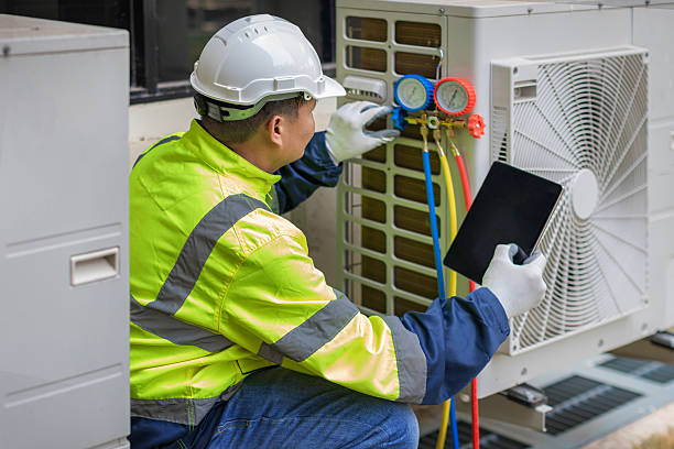 Professional Heat Pump Repair technician working in Thayer, MO